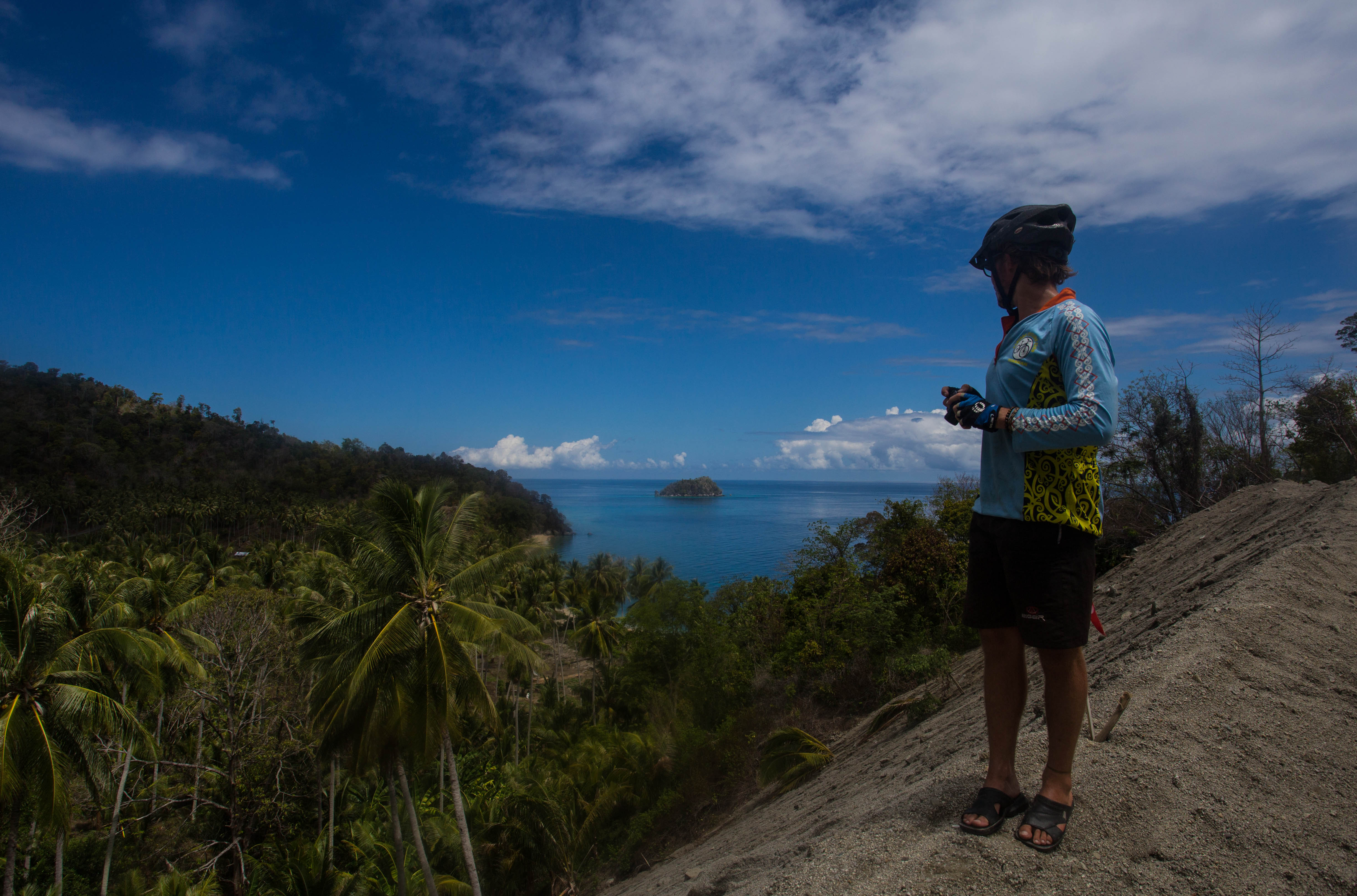 Clément stopping to photograph yet another section of the idyllic tropical coastline of Sulawesi