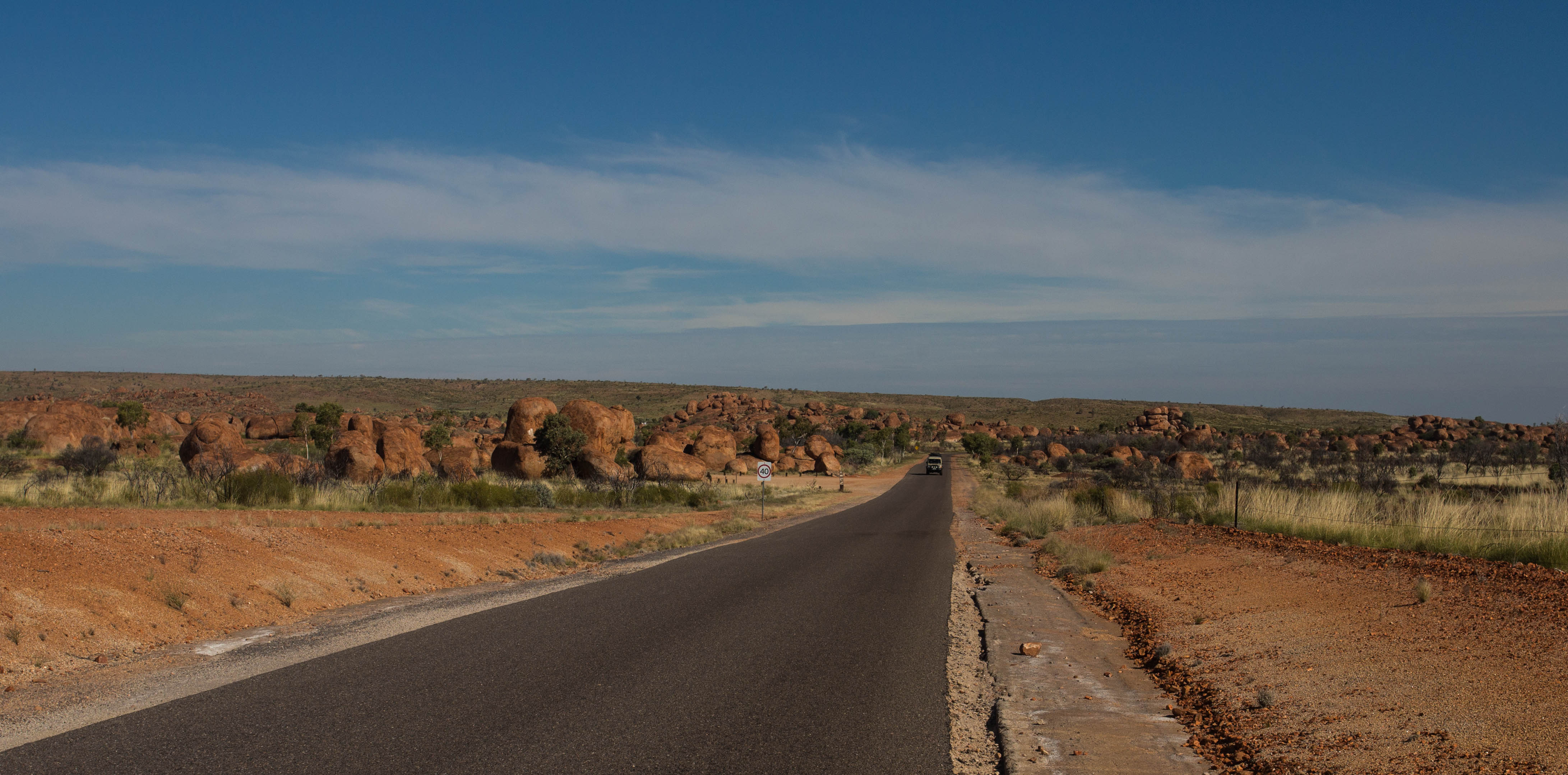 Reaching an unexpected sight in the middle of this vast desert: Devils Marbles or Karlu Karlu in the language of the Warumungu people