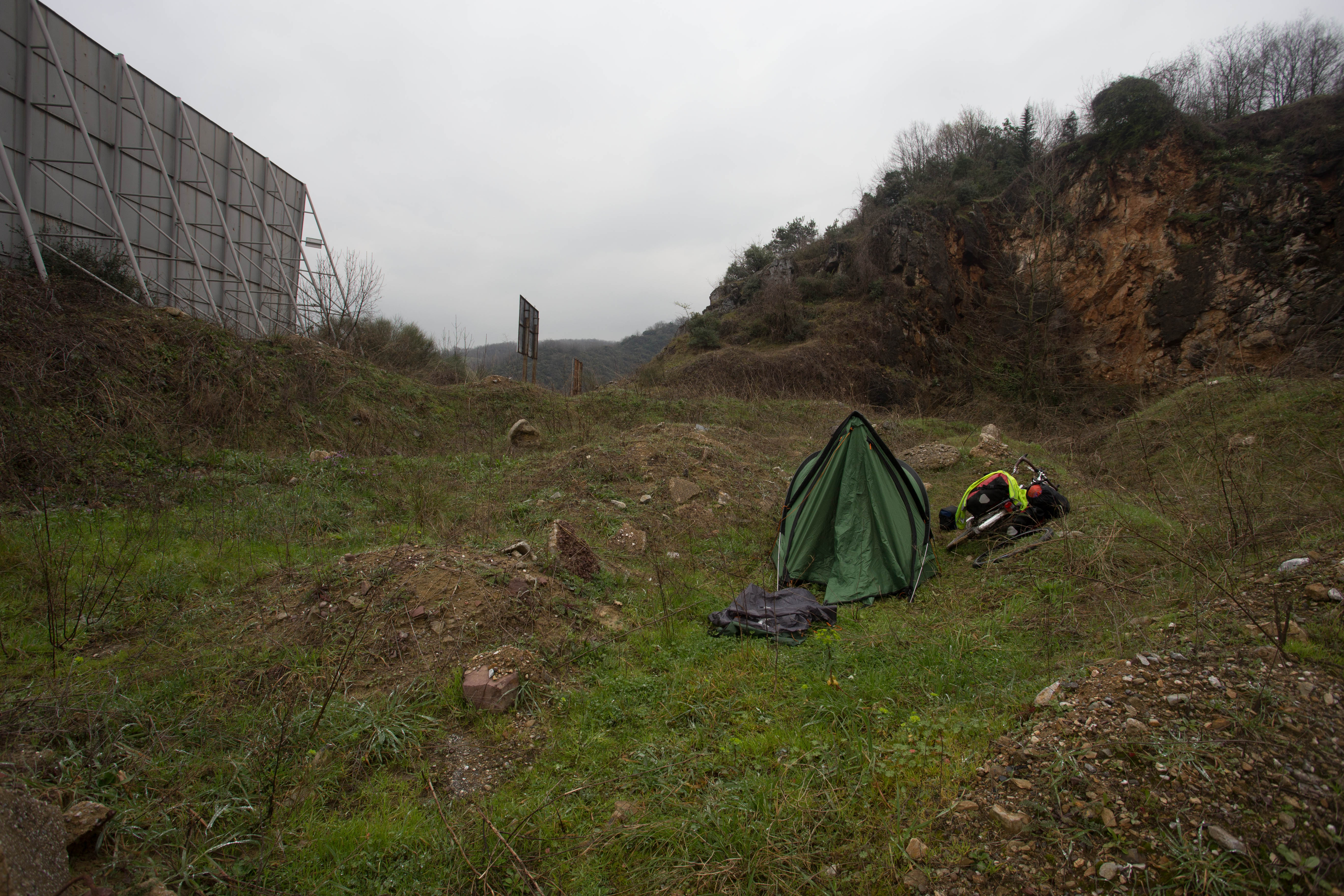 My first wild camp of Asia... amongst rubble and brambles behind a giant billboard