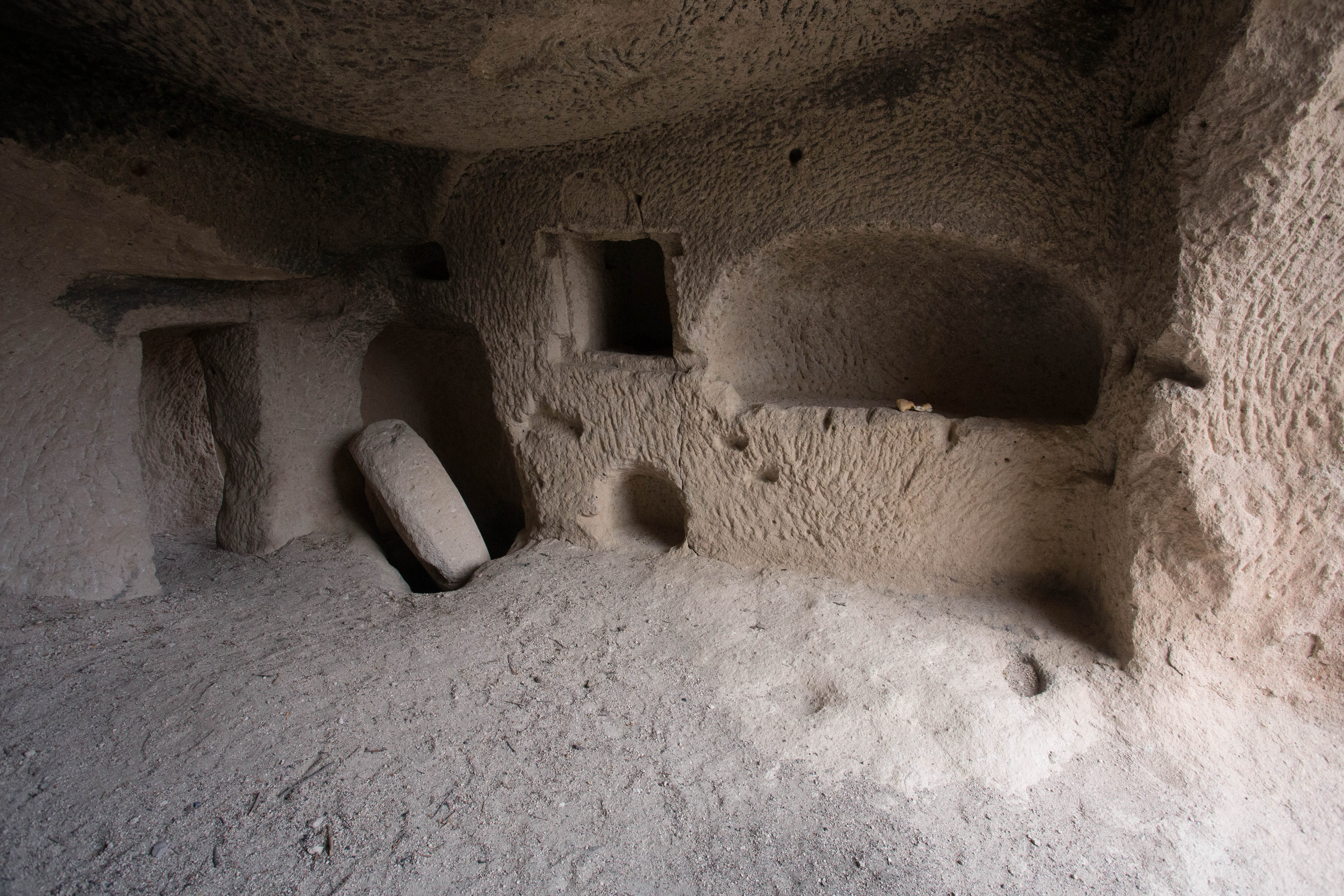 The carved interior of the cave house's ground floor