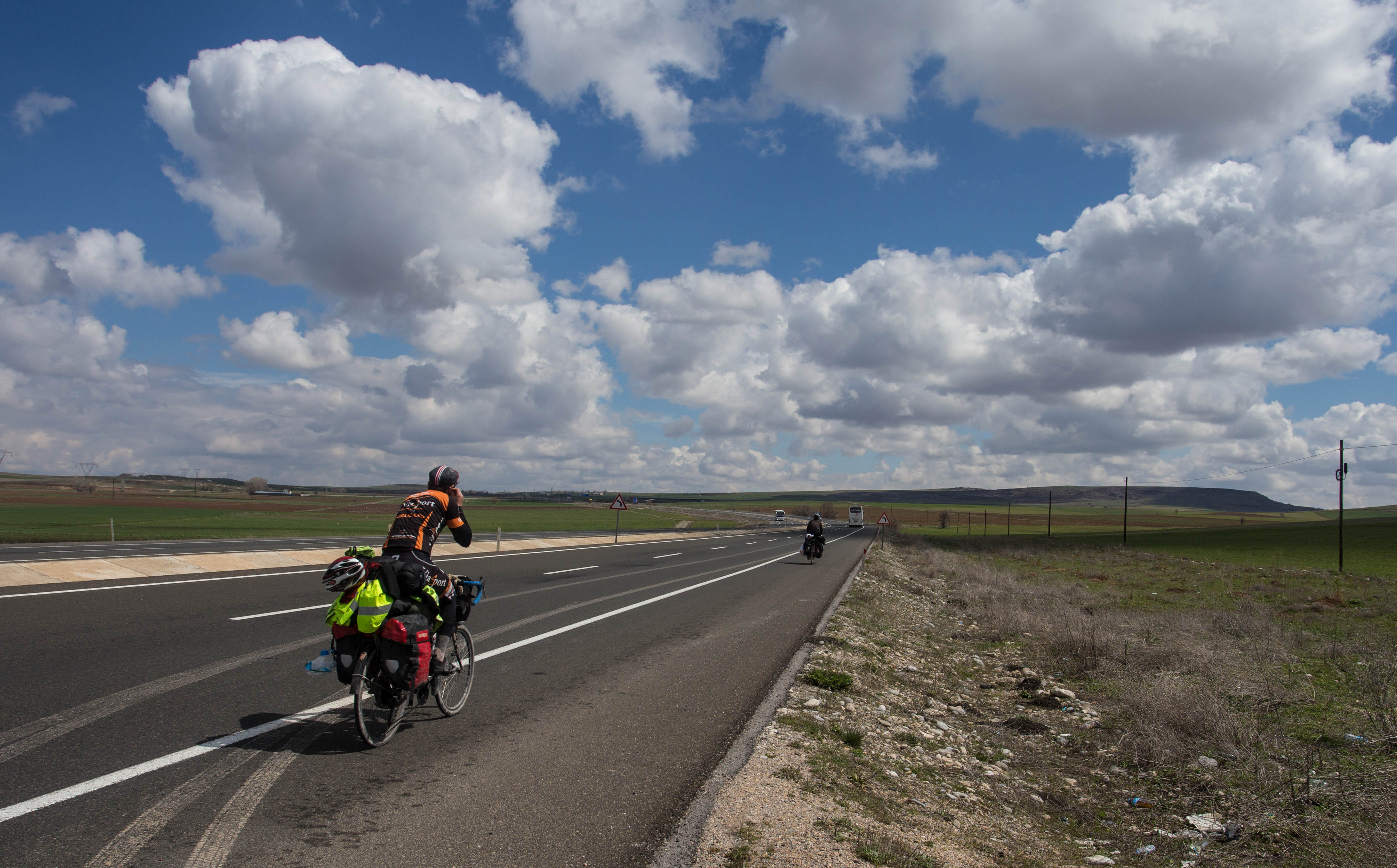 Following the unfamiliar shape of two other cycle tourers along the open plains of Central Turkey