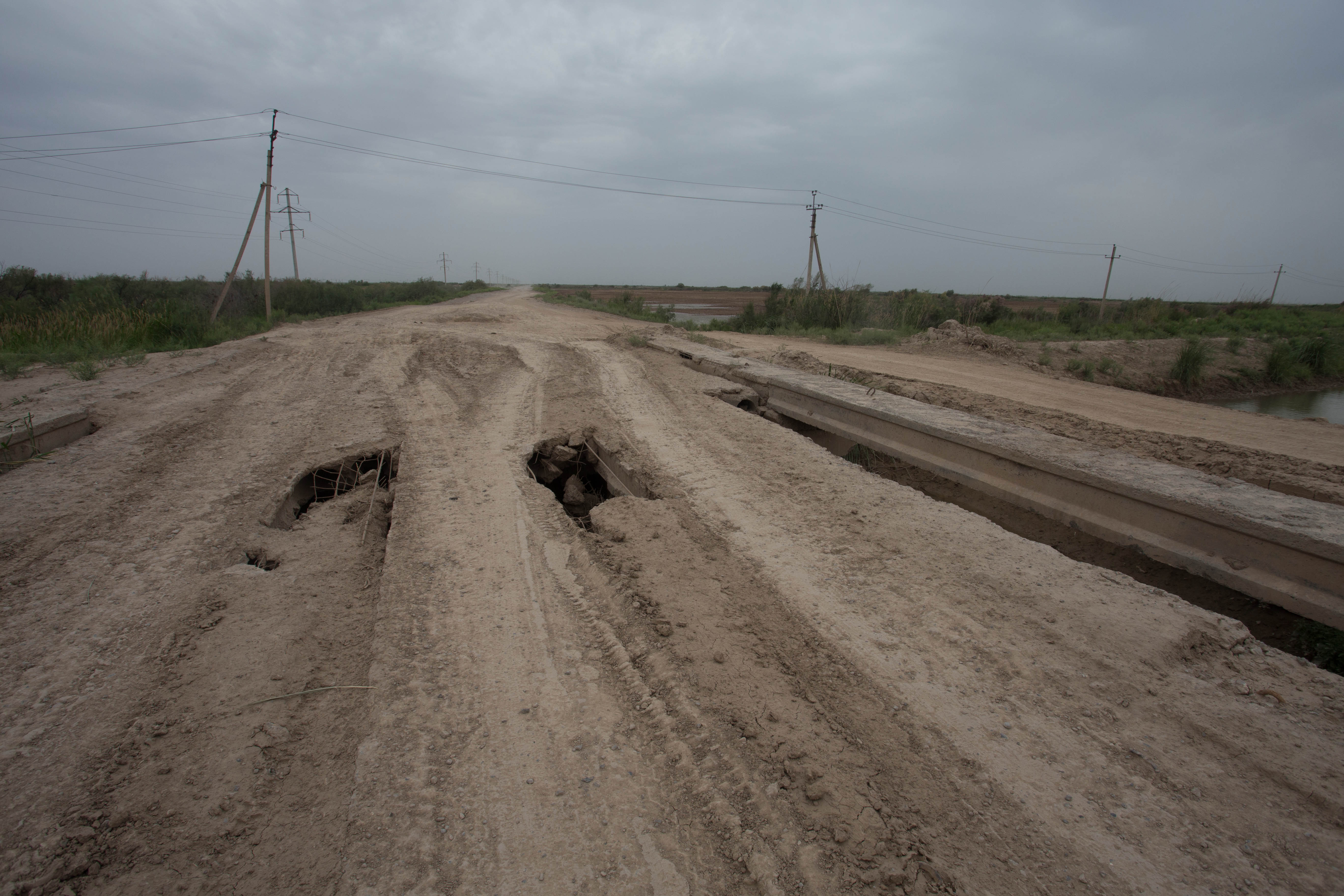 This road had long been left to deteriorate, yet it was the quickest and shortest route for me across Turkmenistan