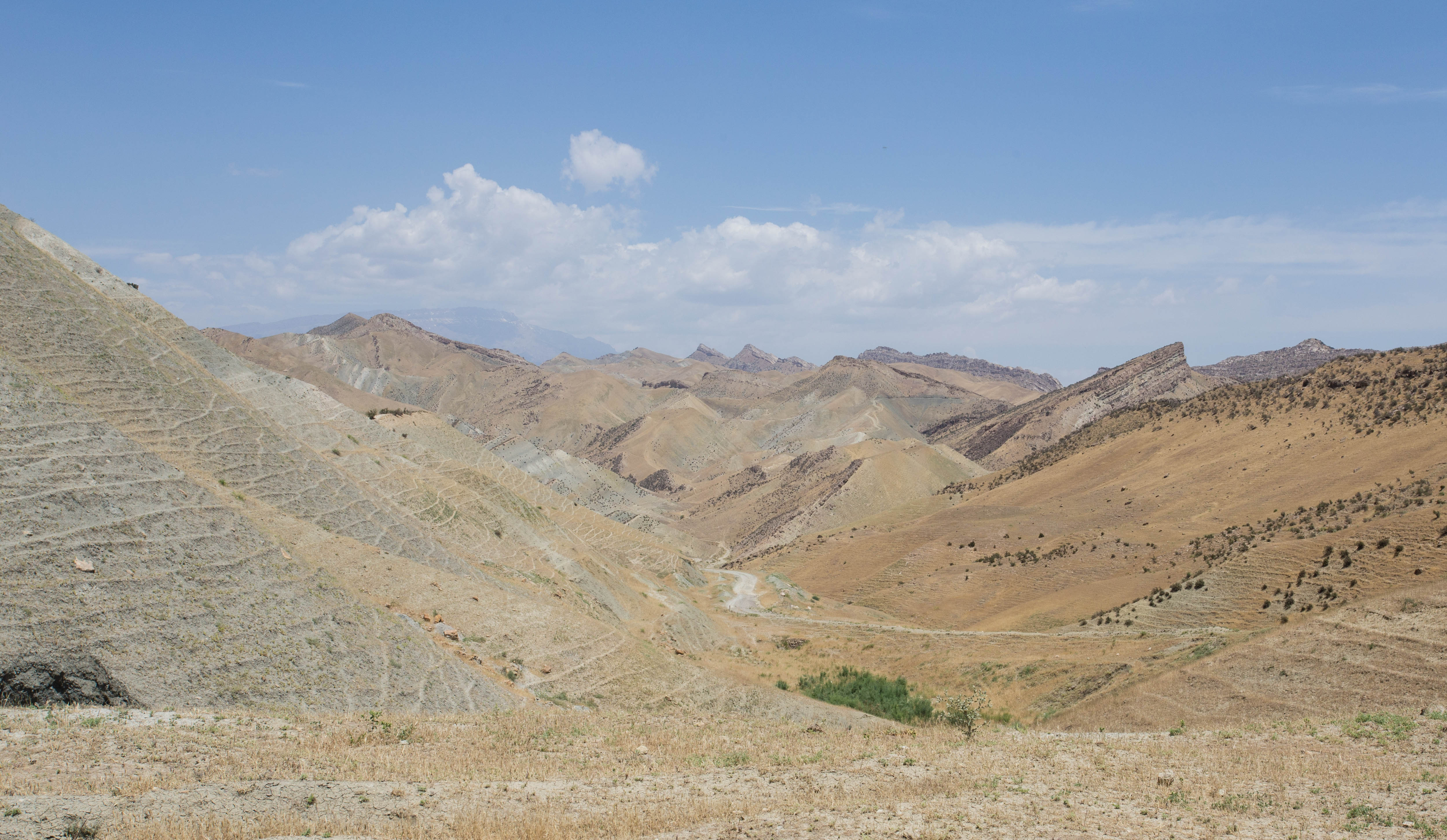 The dry, golden hills of eastern Uzbekistan as I close in on the Tajik border