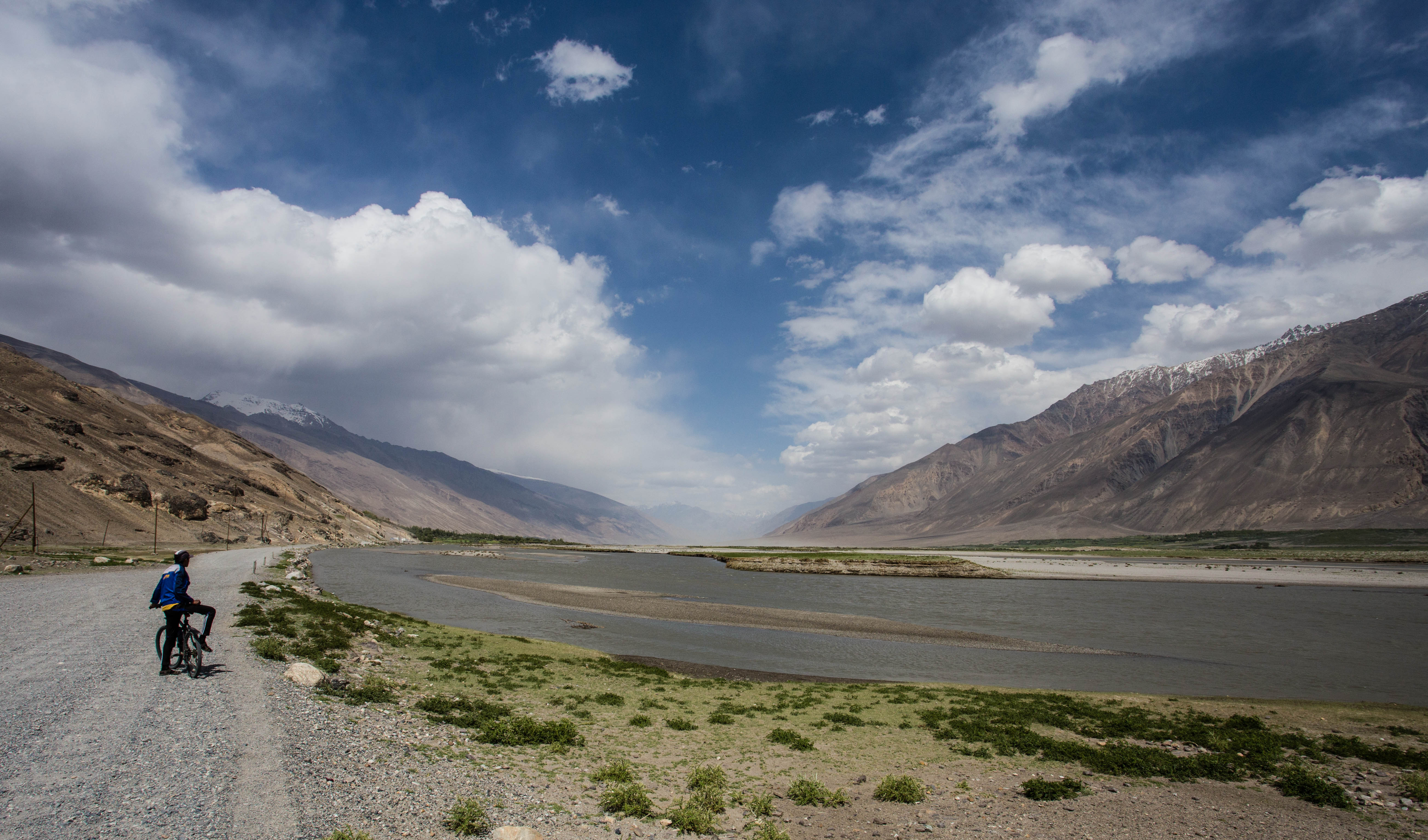 Pedalling with a local teenager who was on his way home. He was able to show me the smoothest lines on this rough track.