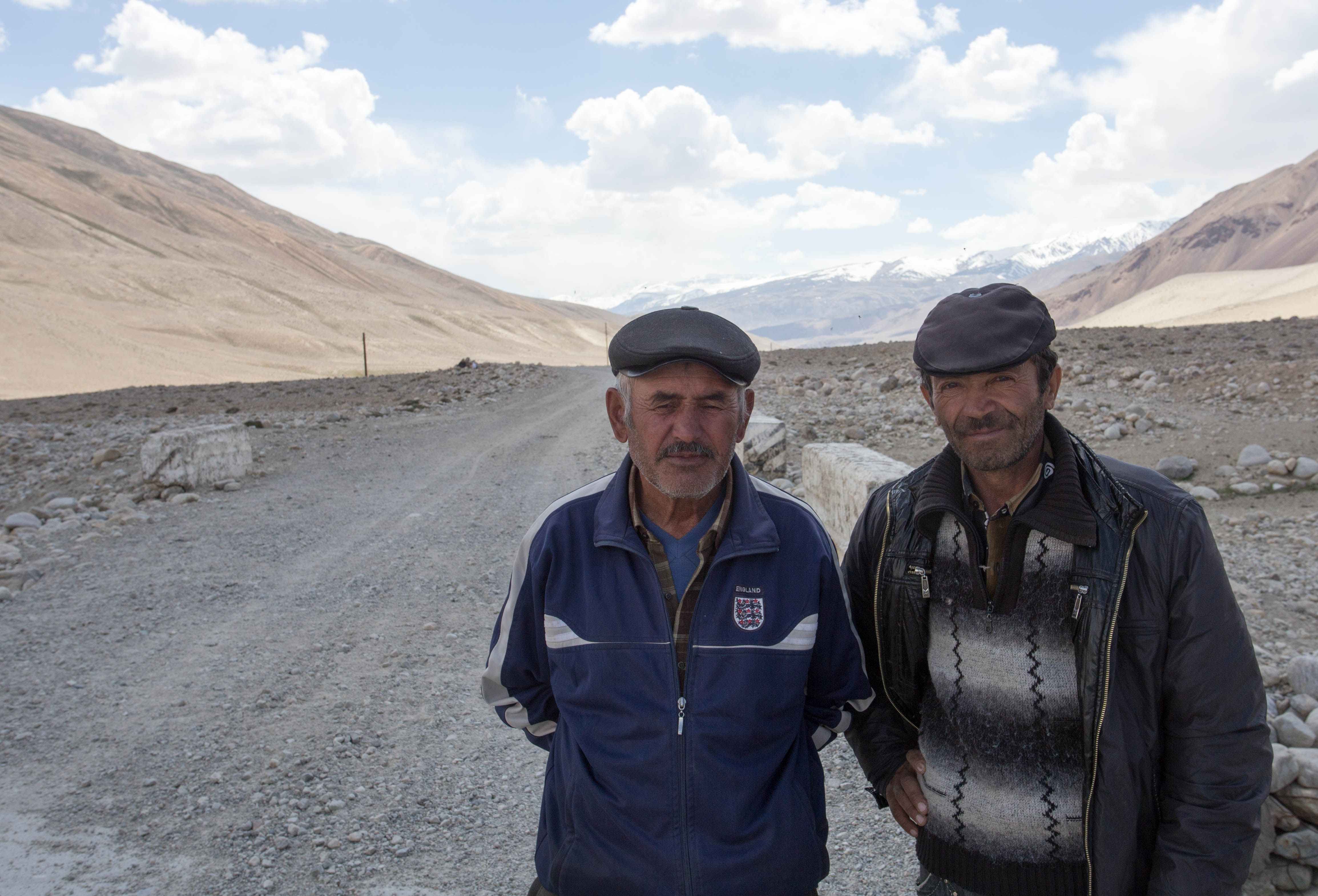 Two Pamiri gentlemen who I came across in the wilderness waiting hours for a vehicle to pass which could give them a lift