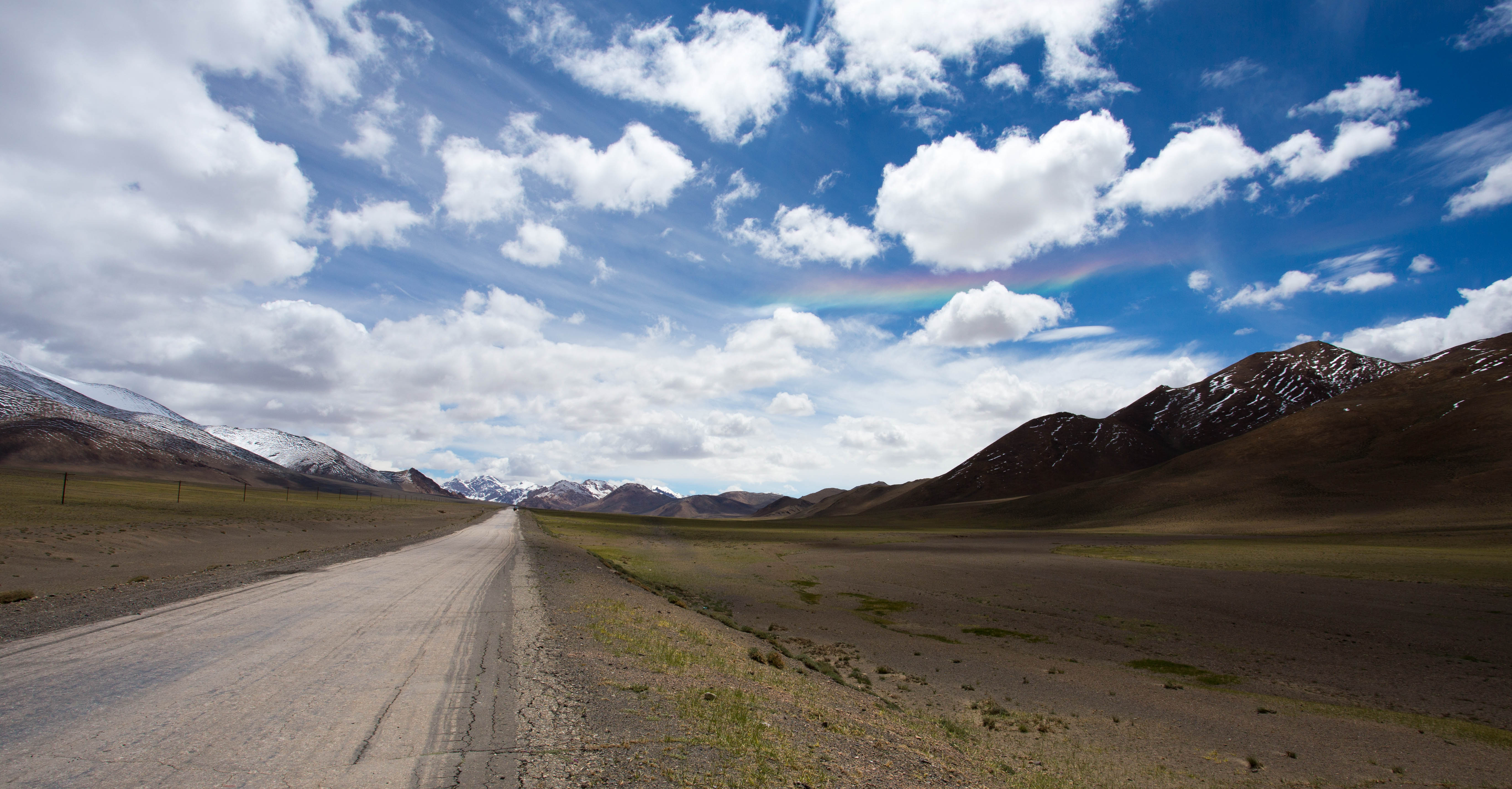 A straight rainbow cutting across the sky, the first time I had witnessed such a phenomenon