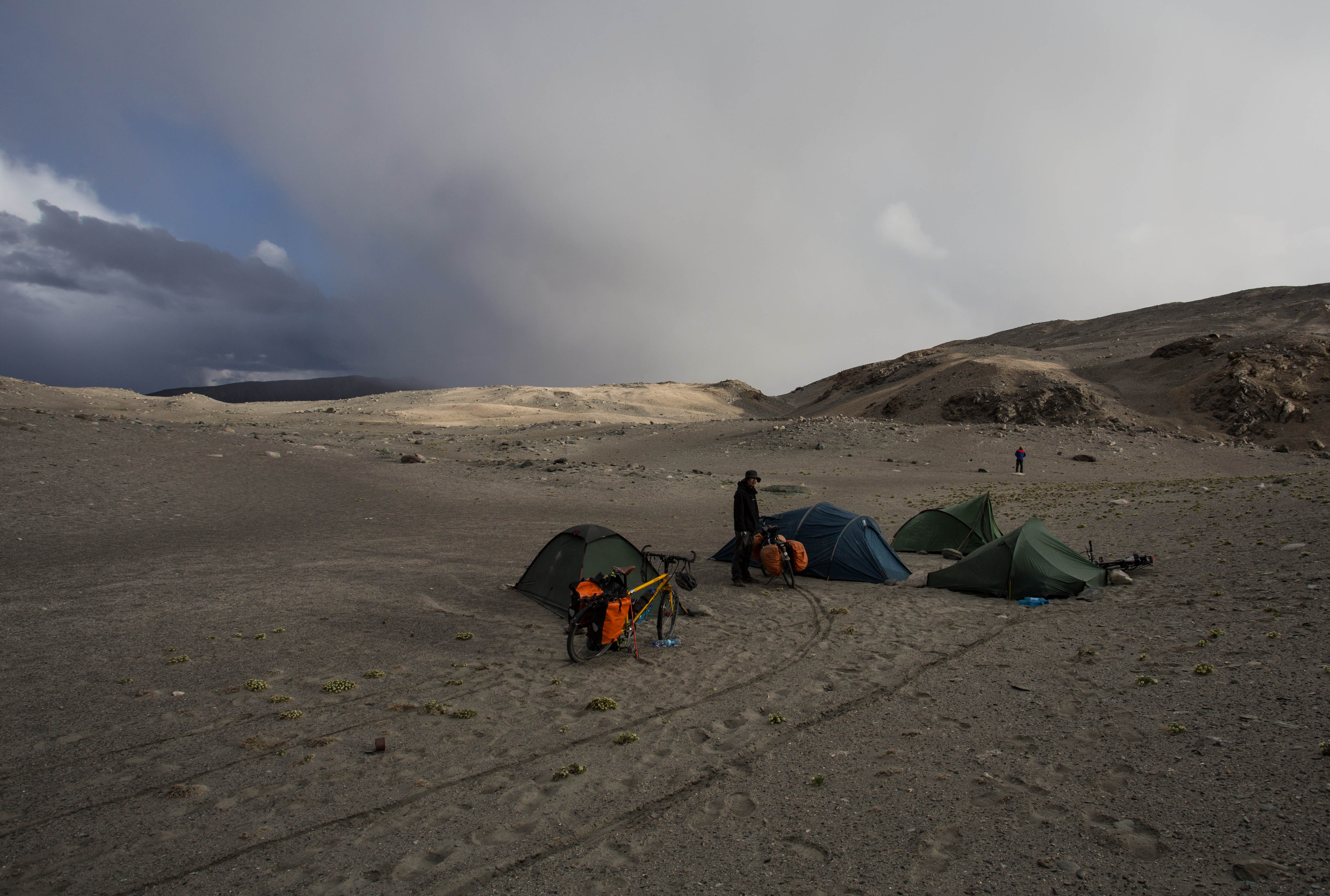 Setting up camp in a lunar landscape on our last night in Tajikistan