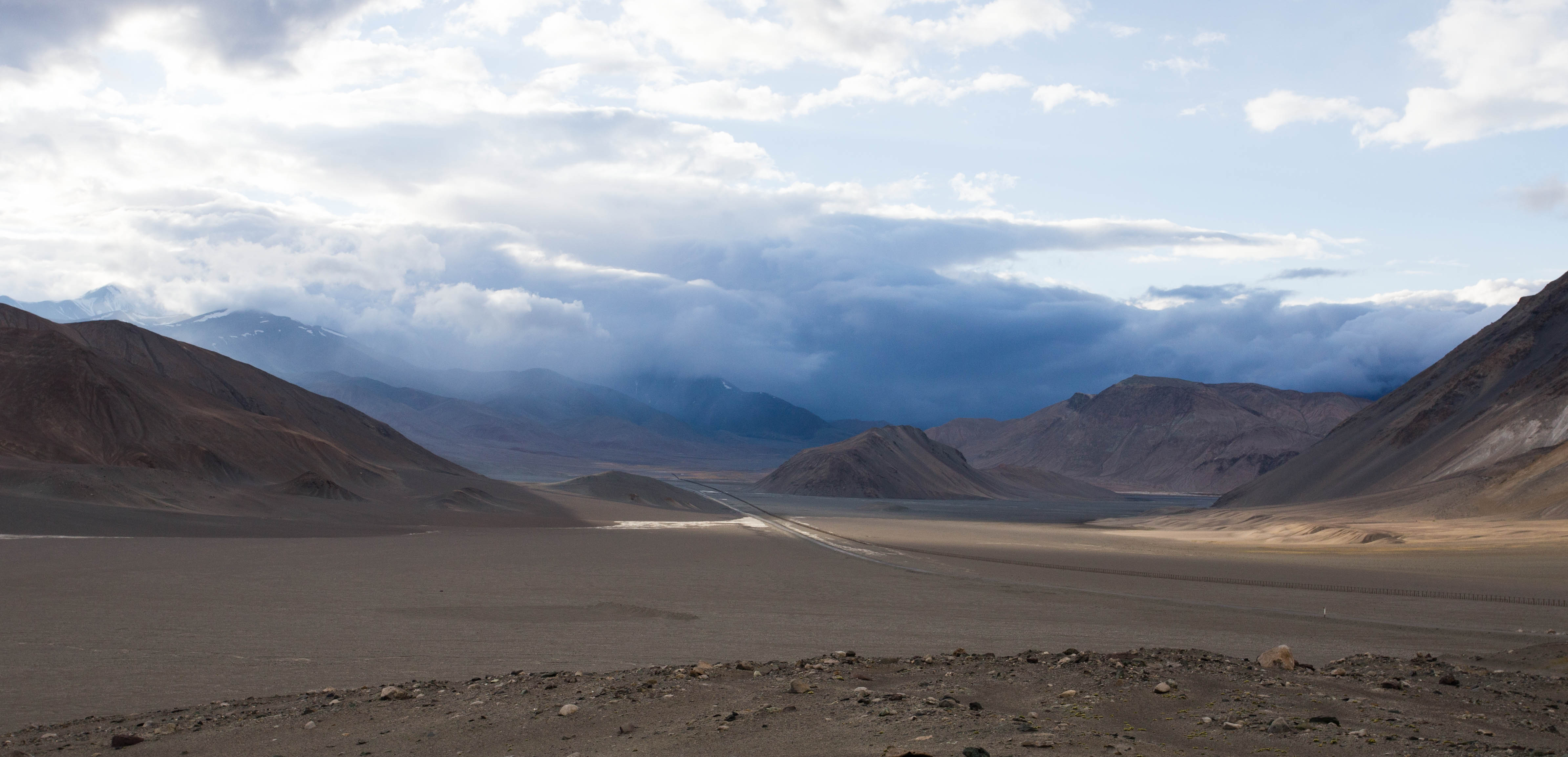 Watching yet another storm roll across the landscape towards us from our sheltered wild camp