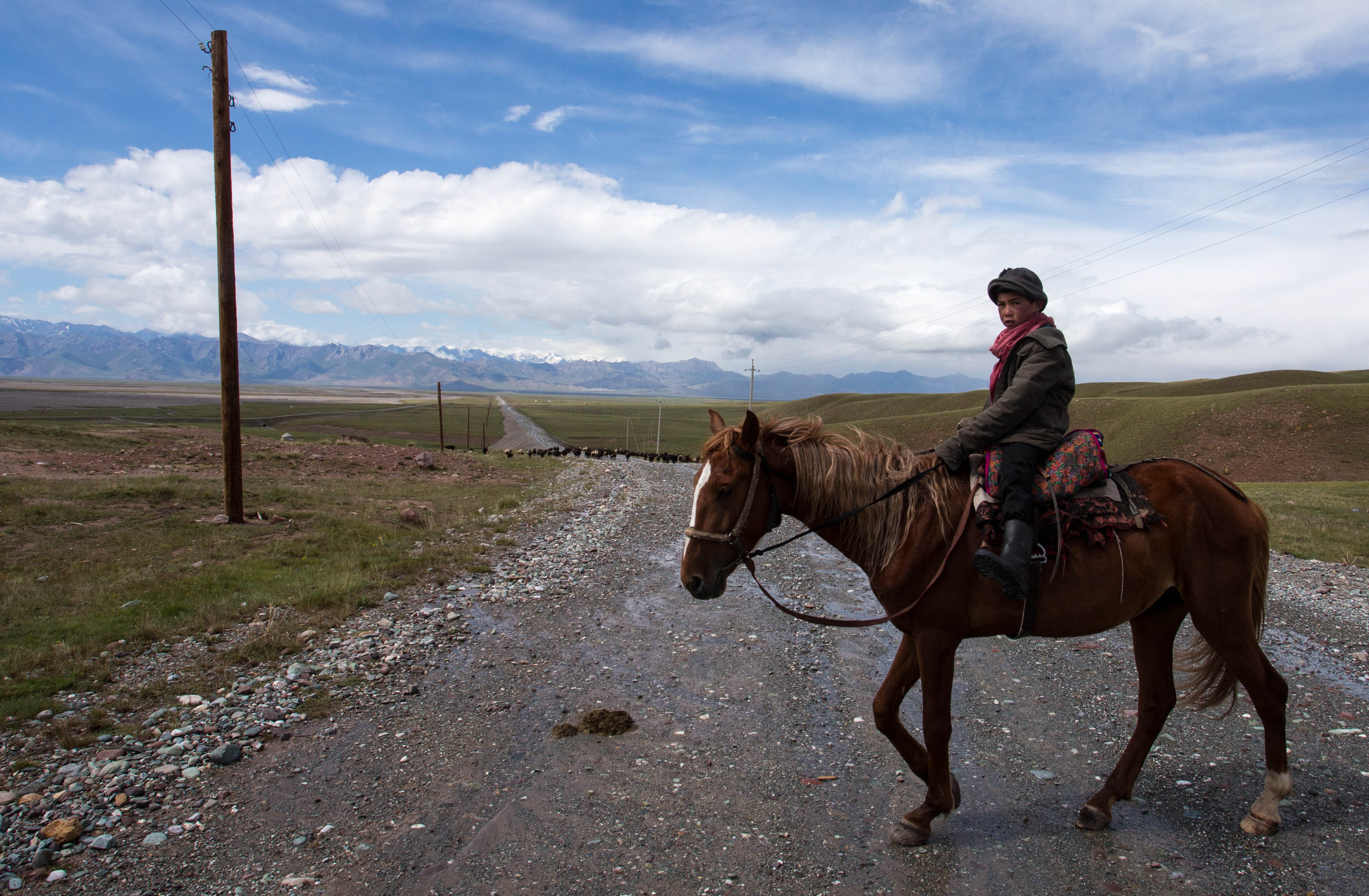 This young kid challenged us to a race down the hill upon entering Kyrgyzstan. He won easily.