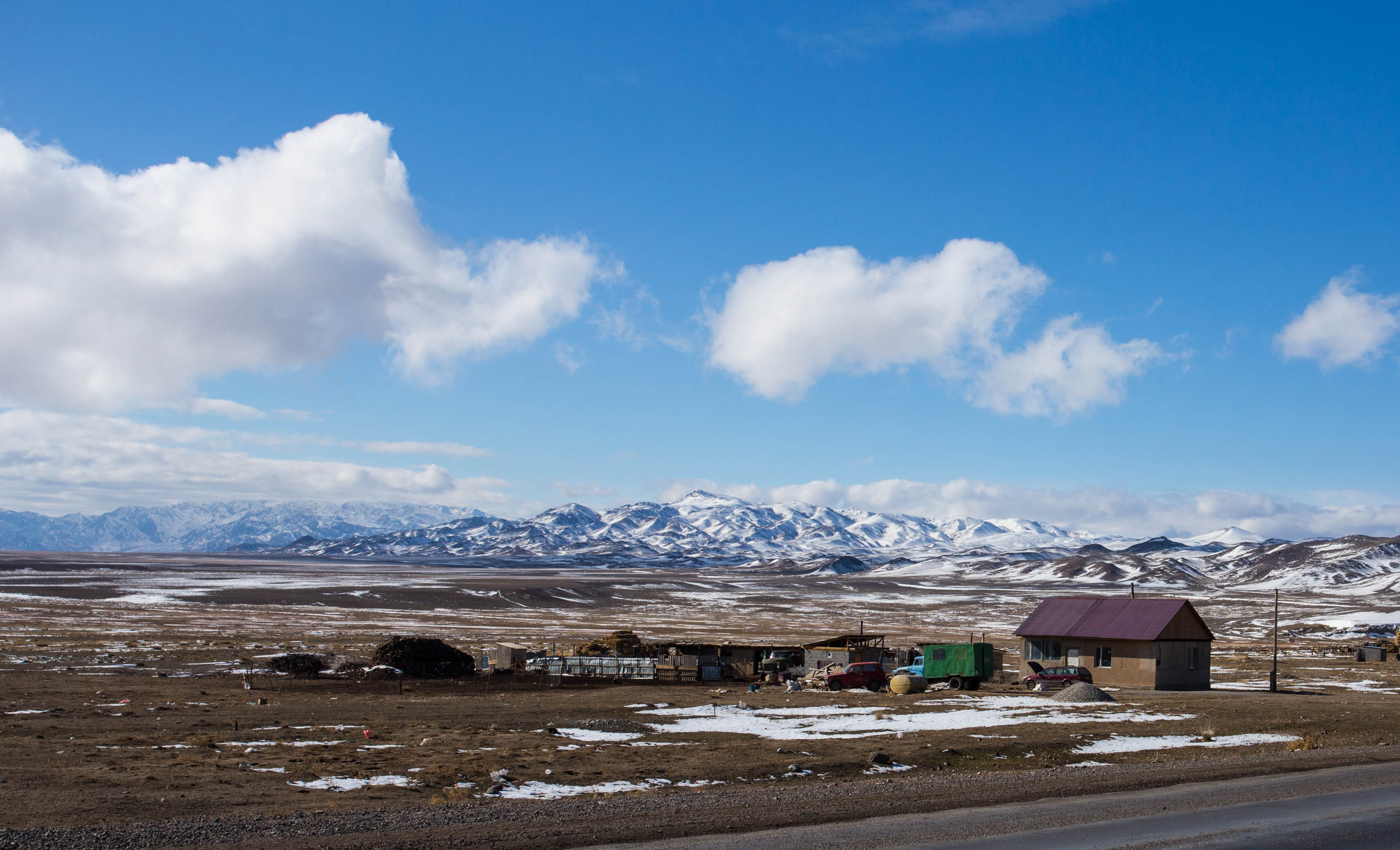 The snow-scattered landscape between Almaty and the Chinese border