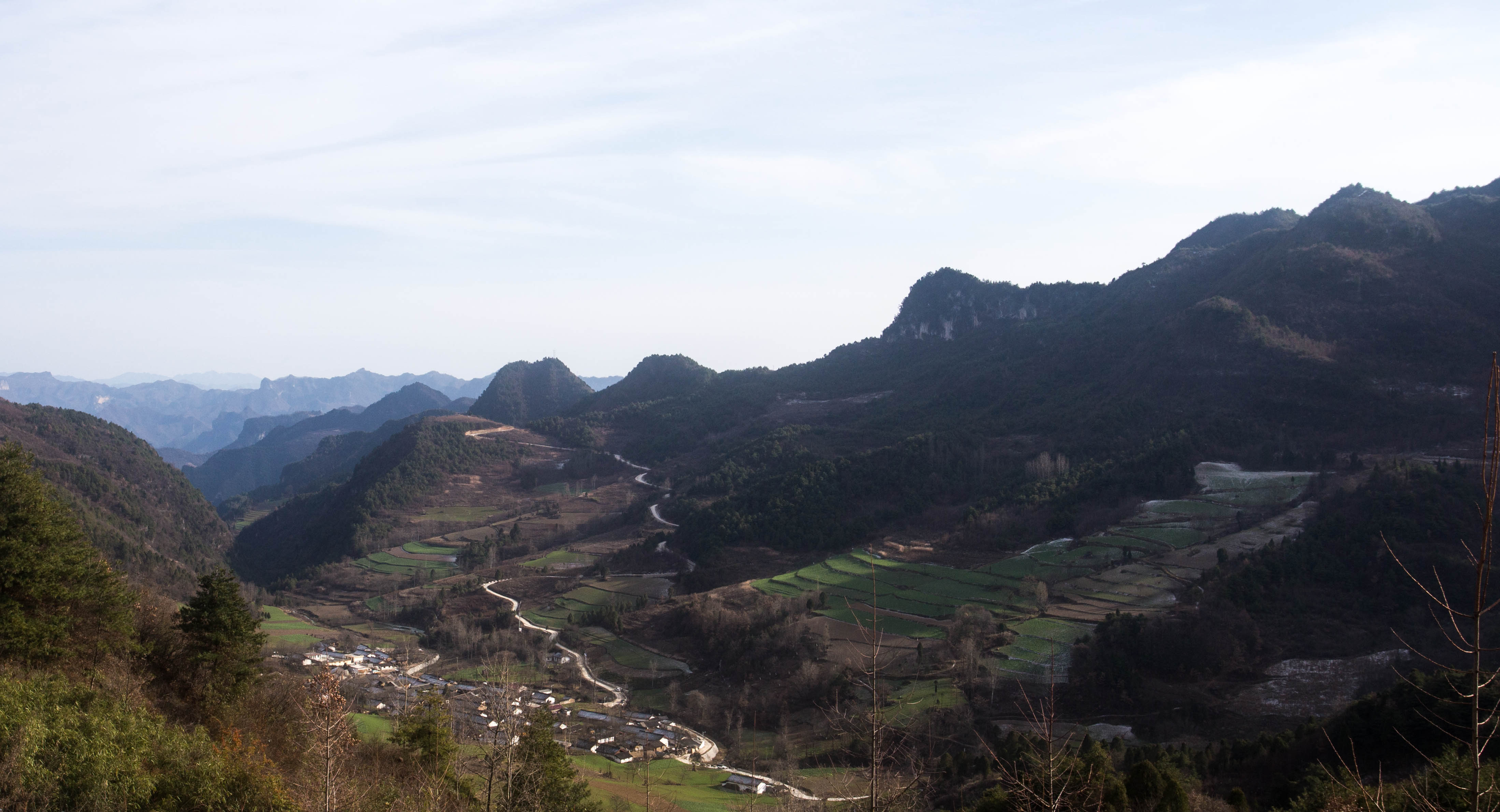Passing through a rarely-visited piece of rural China, overlooking the village of Xiaobadicun