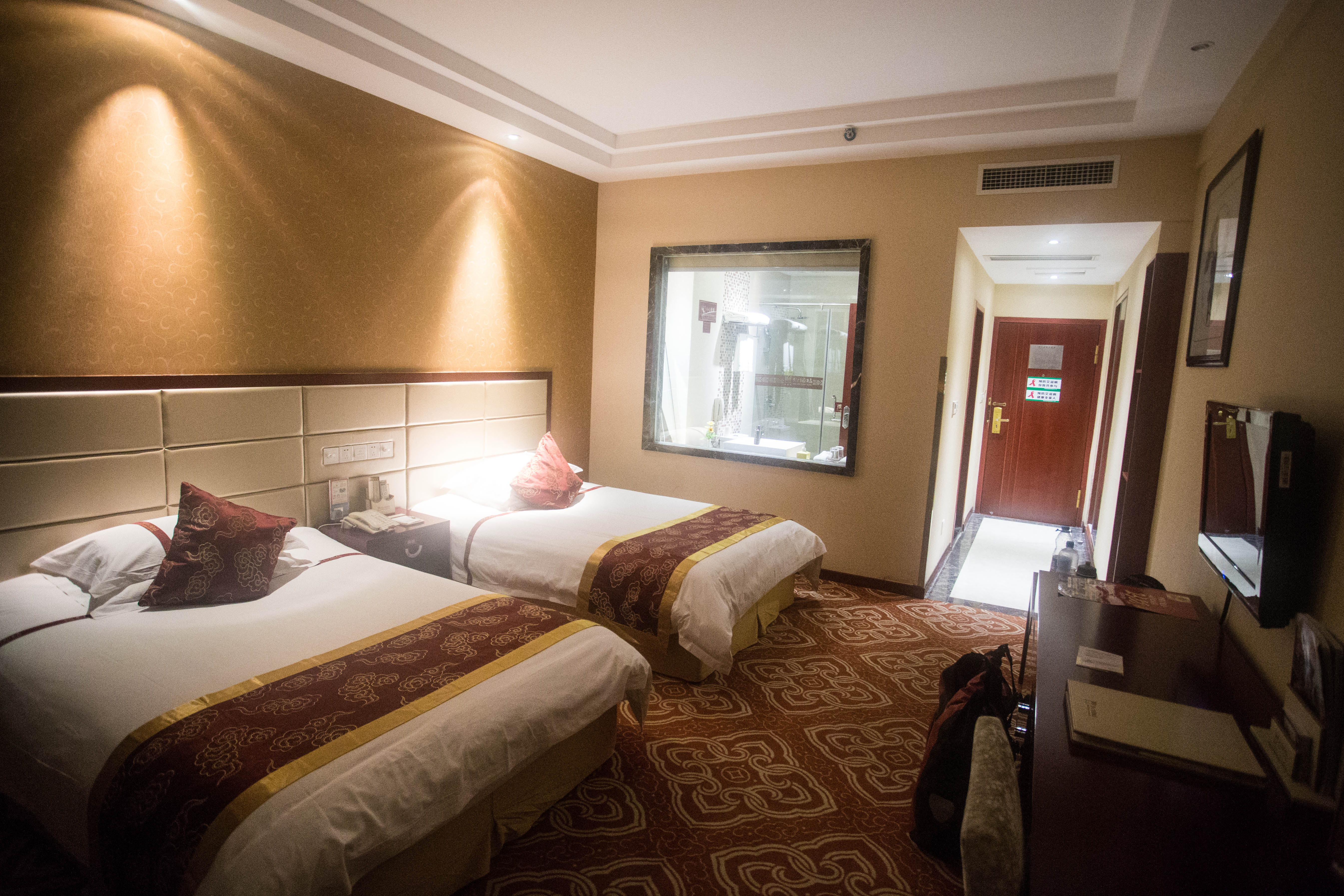 In many Chinese cities I would only be allowed to stay in fancier hotels like this. Thankfully upon seeing my torn clothes I would usually be given a discount!