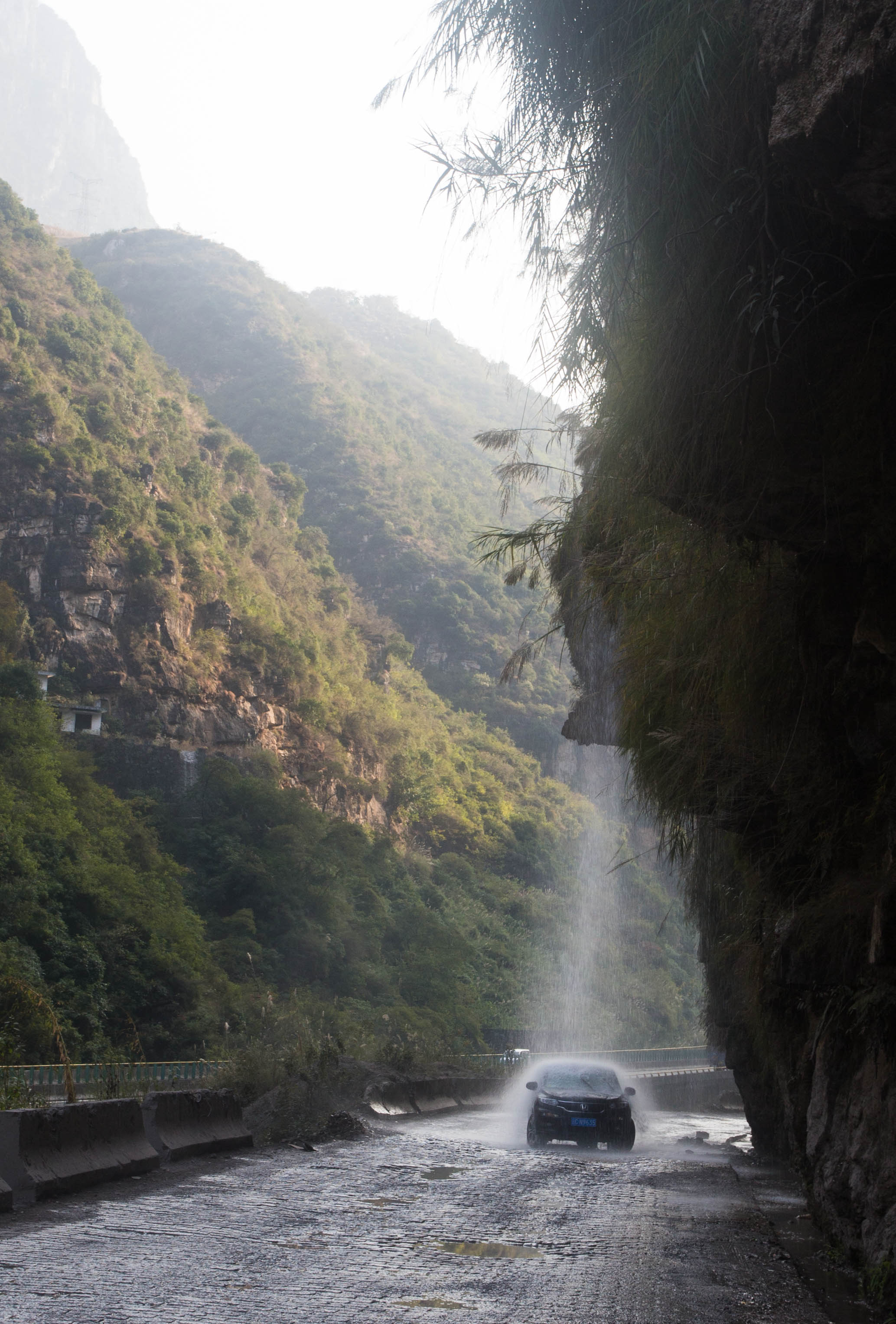 This driver was repeatedly driving into the waterfall and reversing in order to get a free car wash