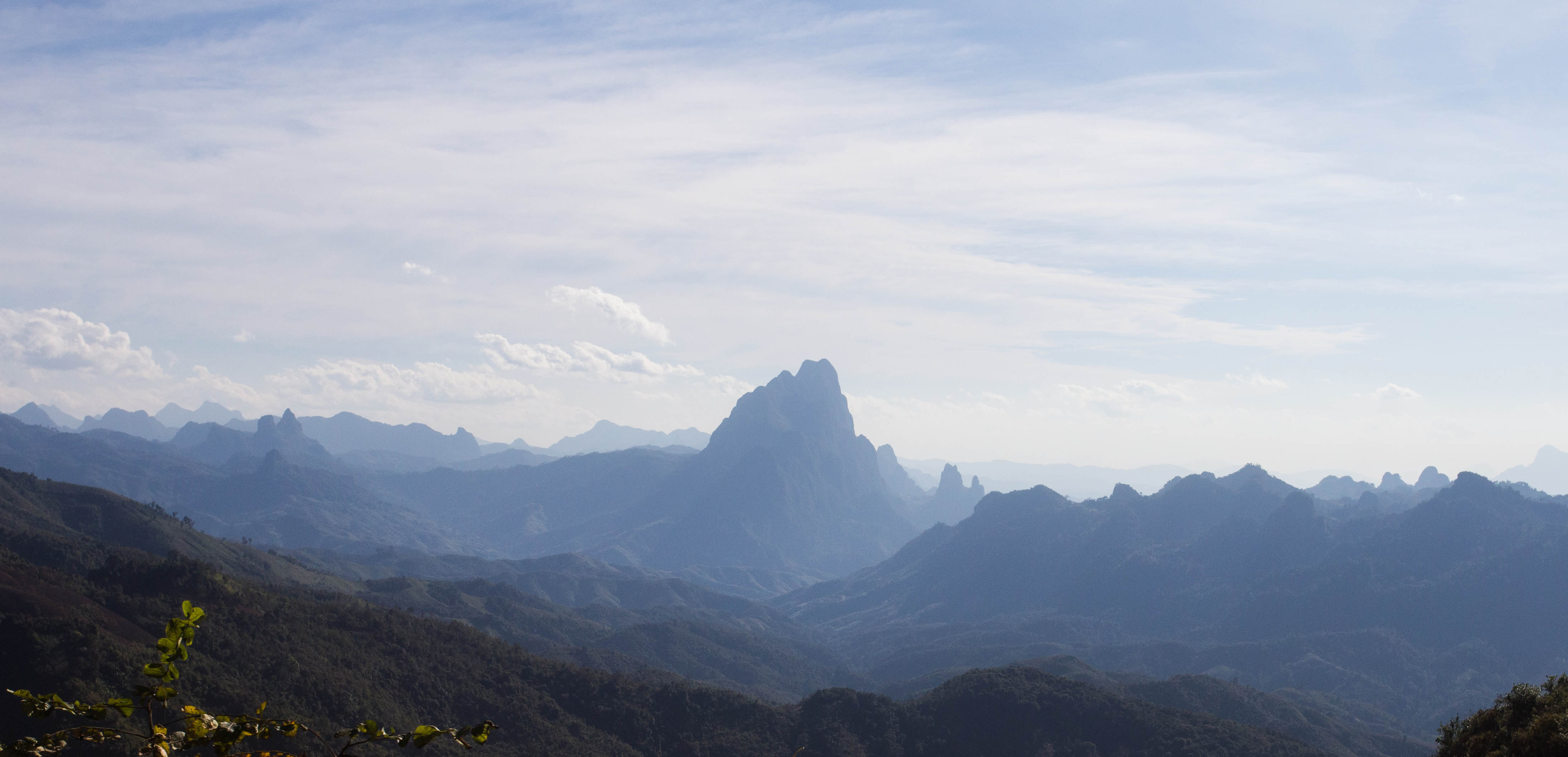 The stunning jungle and karst peaks of Laos which made for such joyful cycling after a tough ride across China