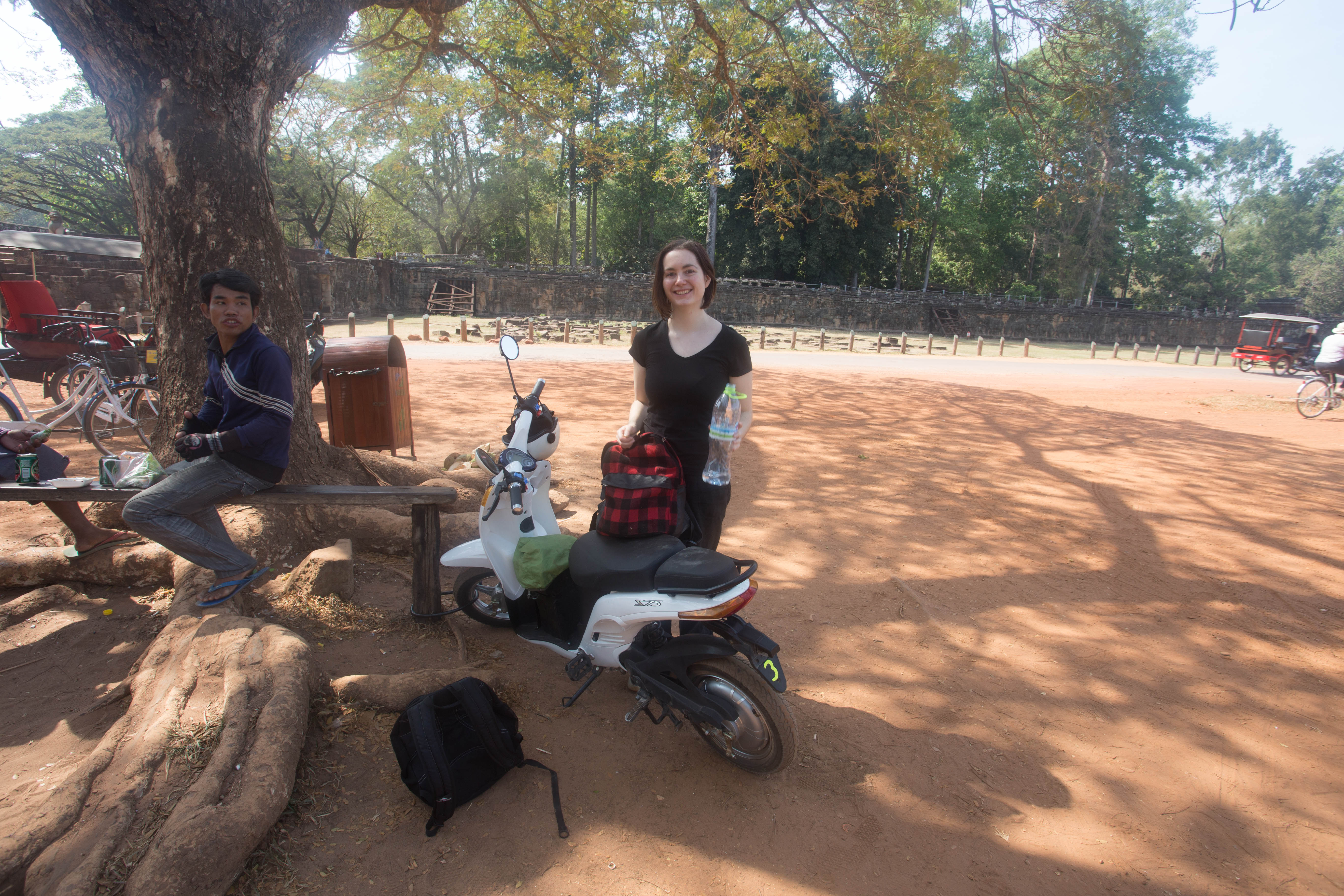 Elana by the electric scooter we spent three days driving around the ancient temple complex of Angkor Wat
