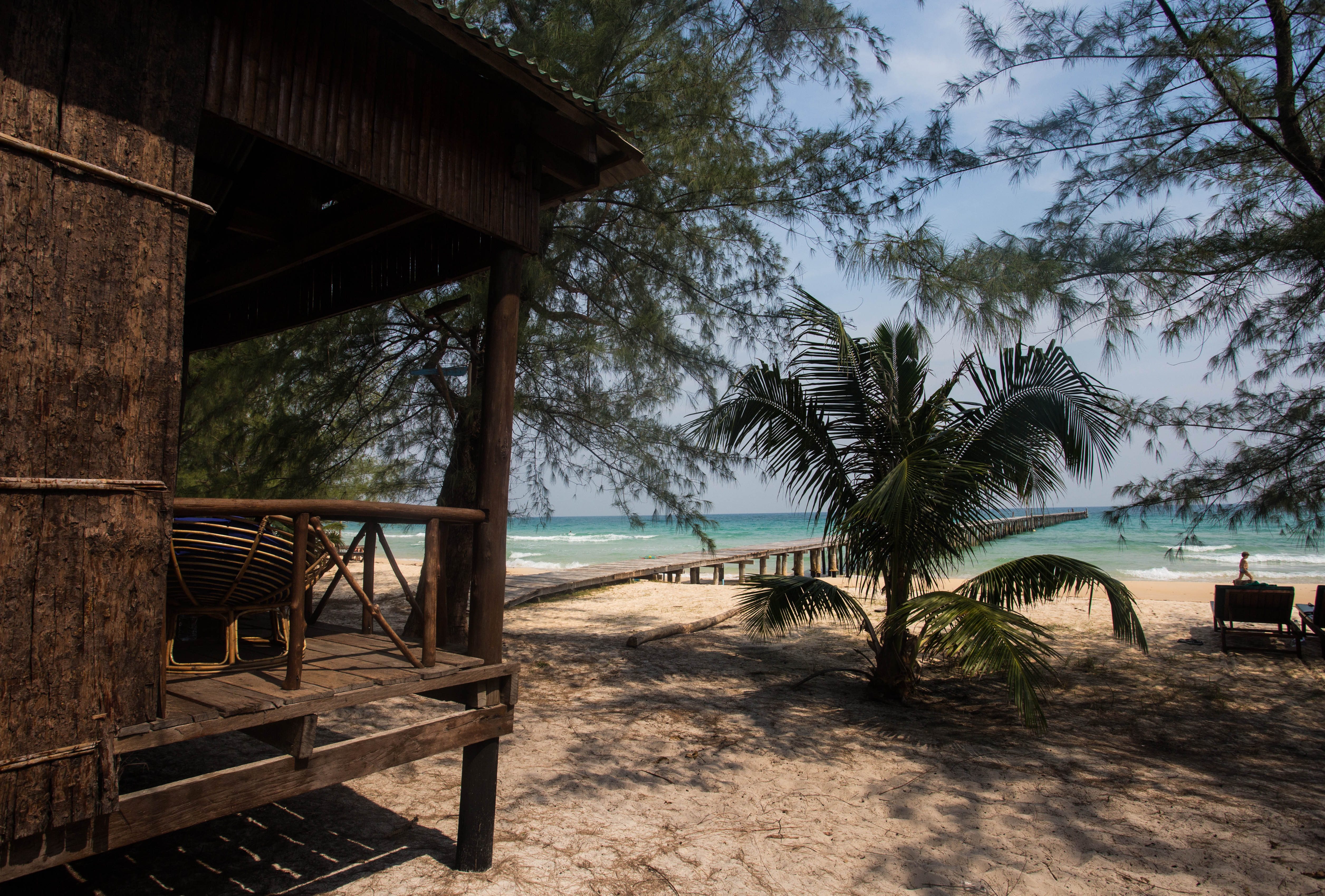Our charming wooden bungalow right on the beach of this tropical island paradise